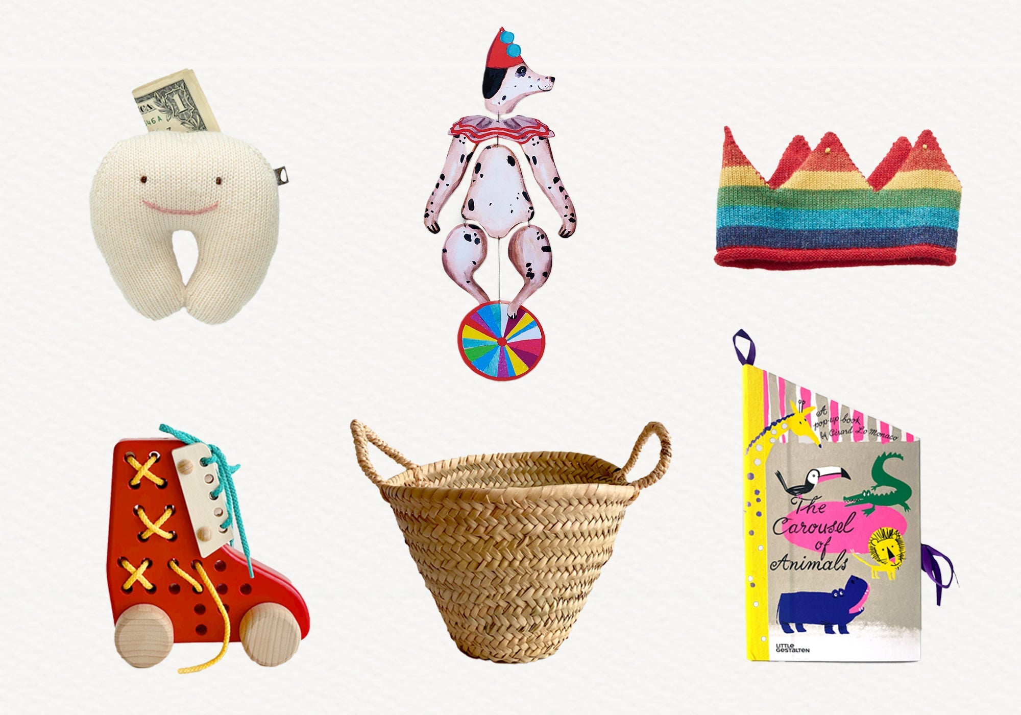 Six colorful children's toys and items, including a tooth pillow, clown dog, crown, shoe, basket, and animal book.