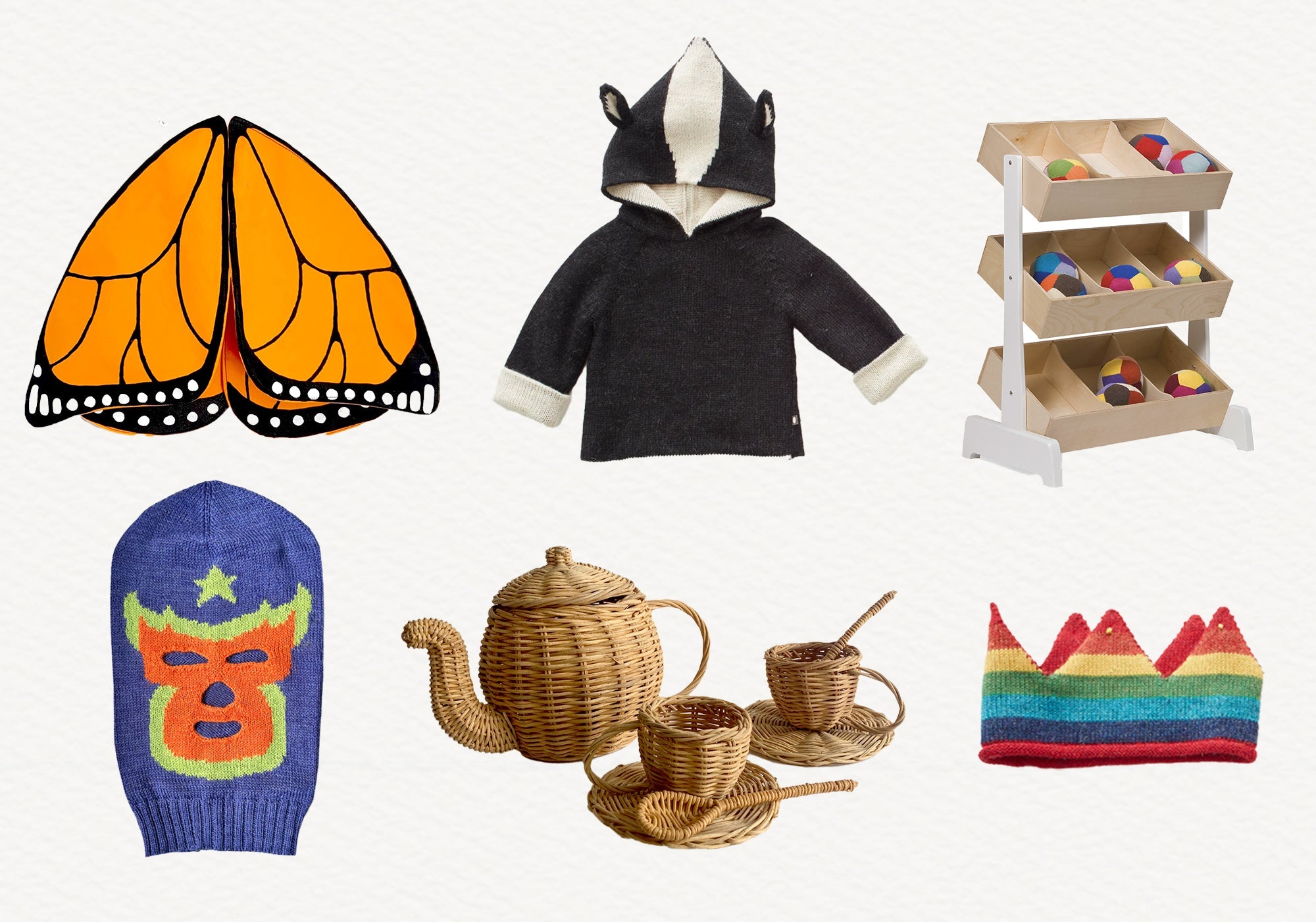 A collage of children's items: butterfly wings, animal hoodie, toy produce stand, mask hat, wicker tea set, and crown.