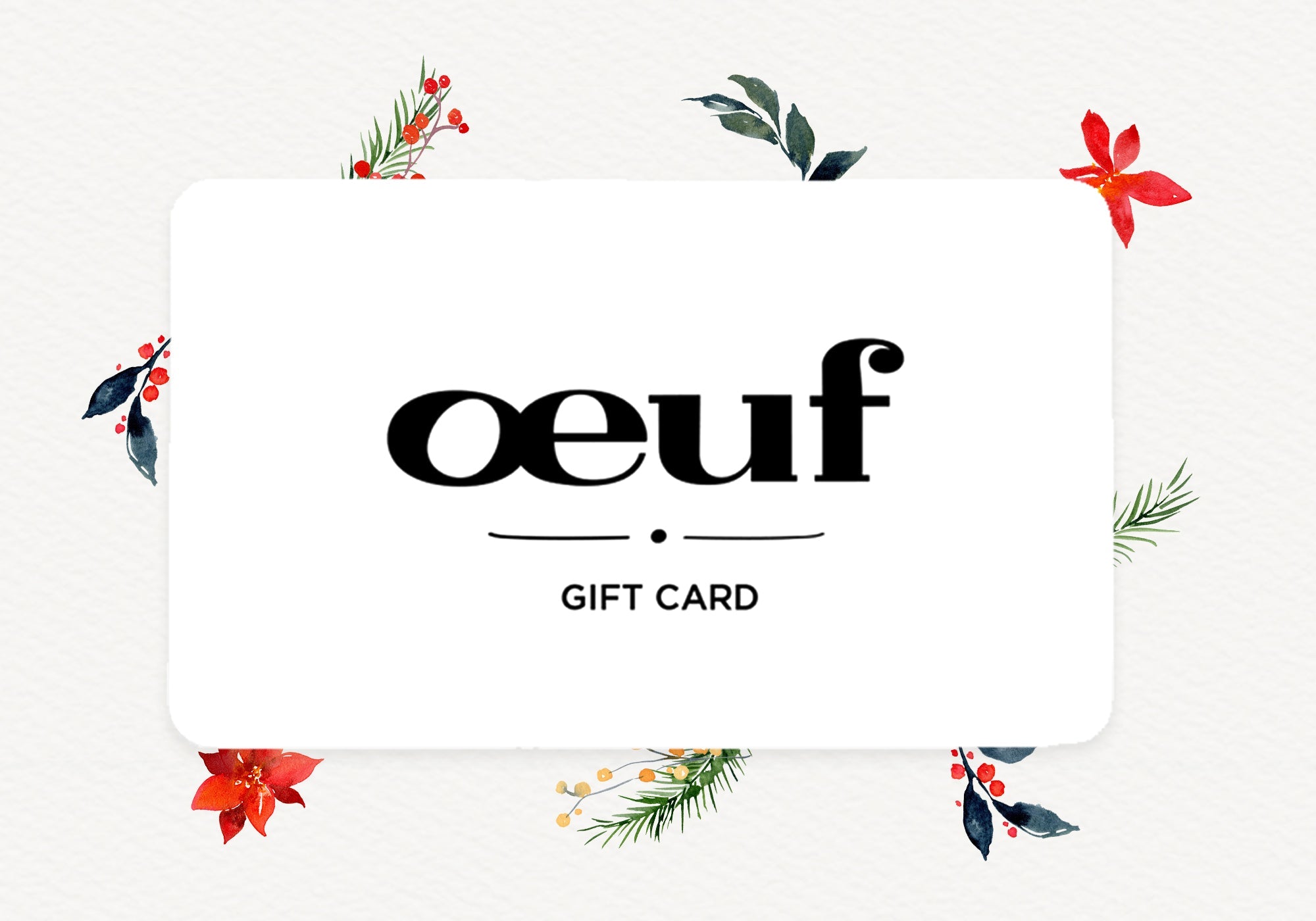 Oeuf gift card with floral and greenery decorations on a white textured background.