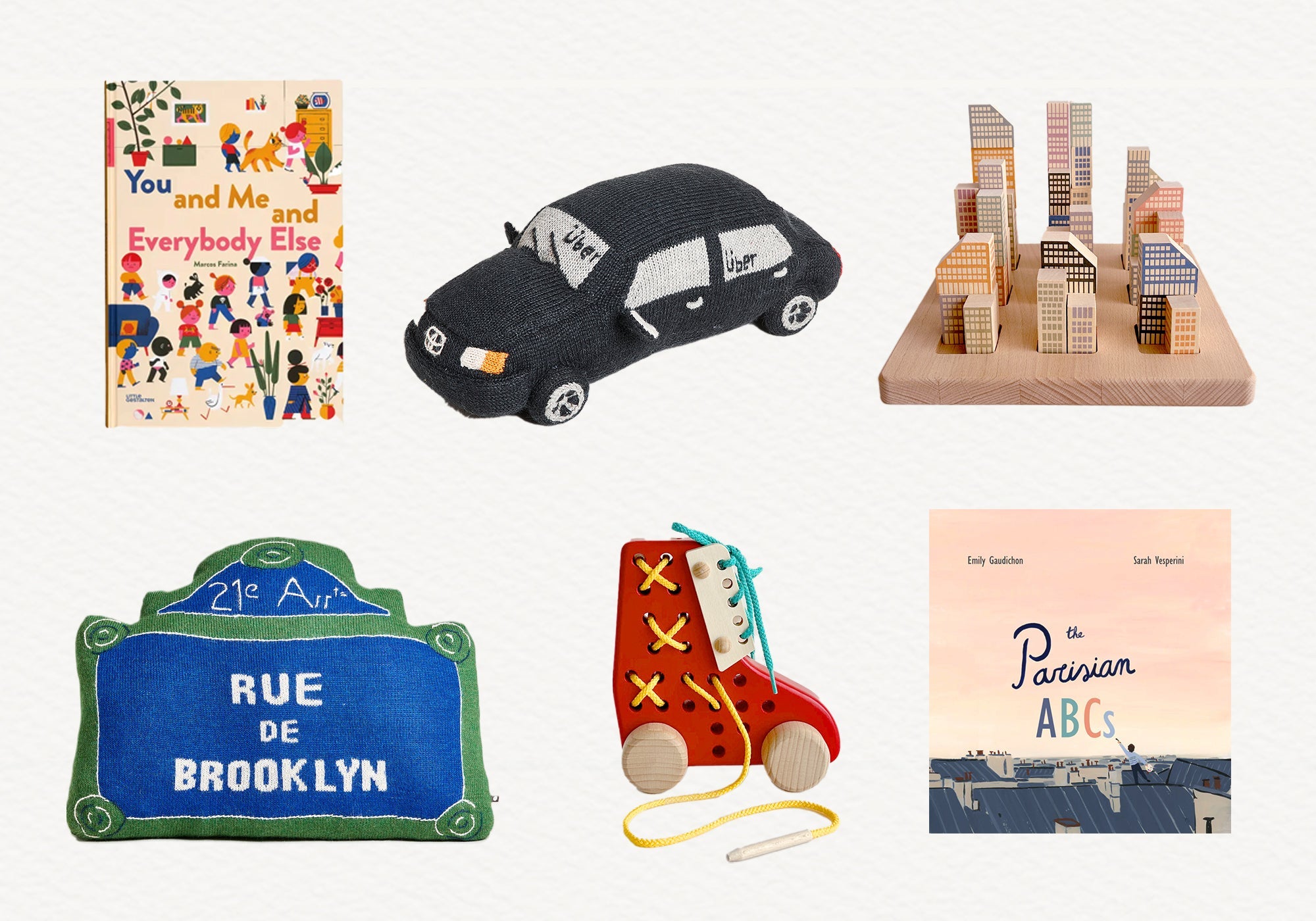 A collage of toys, books, and crafts, including a car, roller skate, city buildings, and ABC-themed items.