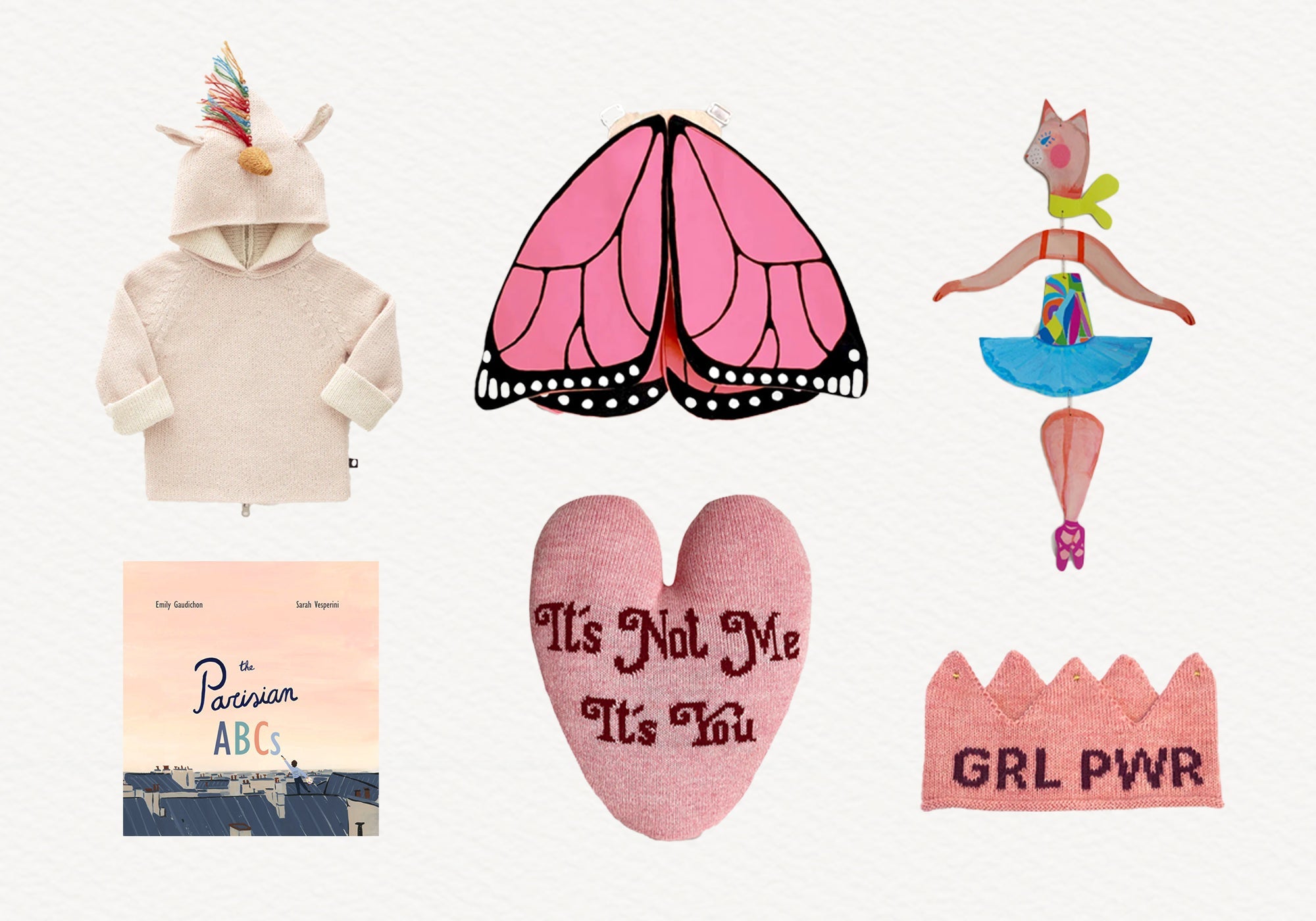 Children’s hoodie with unicorn horn, butterfly wings, cat ballerina doll, ABC book, pink pillow, and GRL PWR crown.