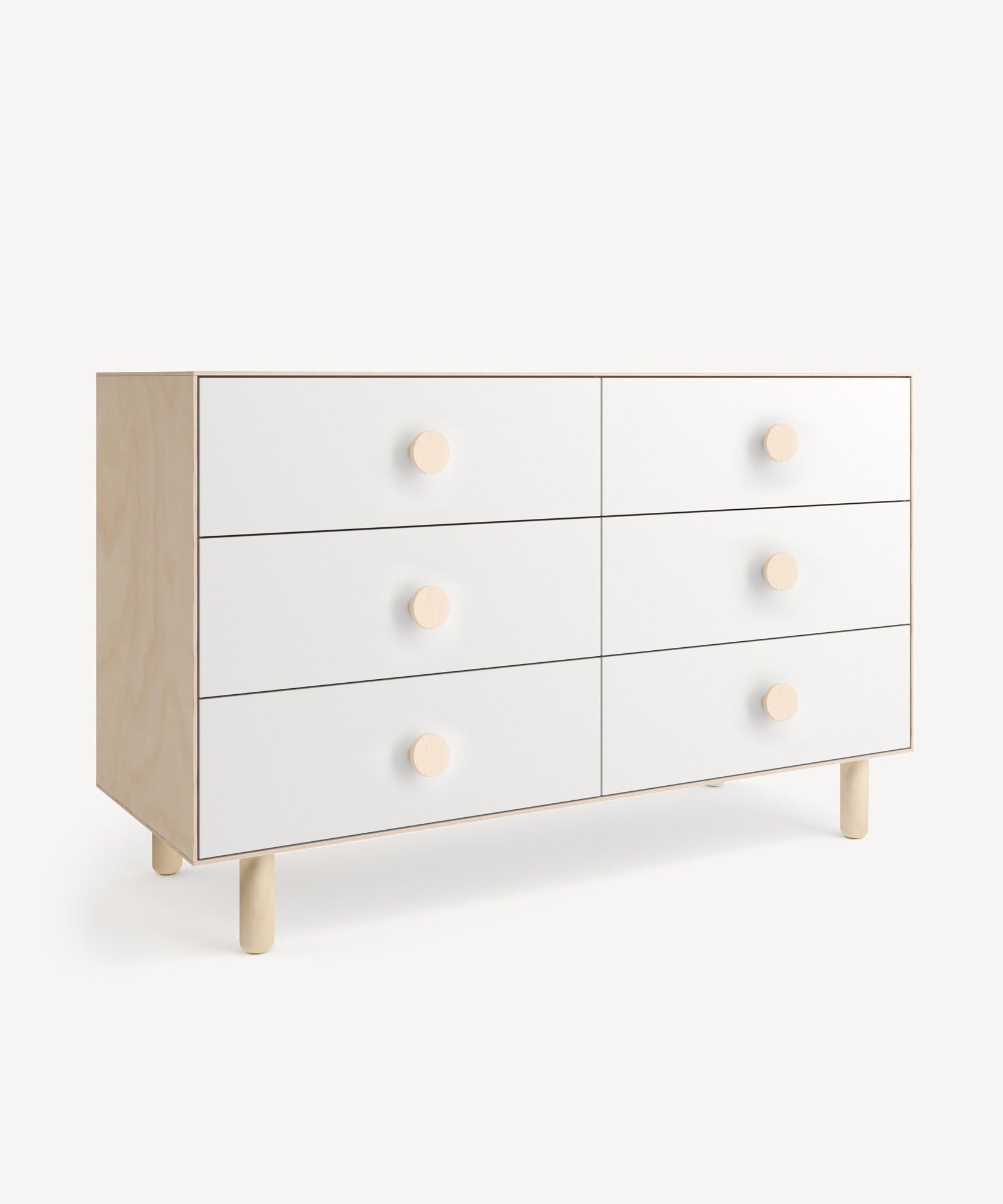 Dot 6-Drawer Dresser: Minimalist white design with round knobs and light wood legs, set against a plain background.
