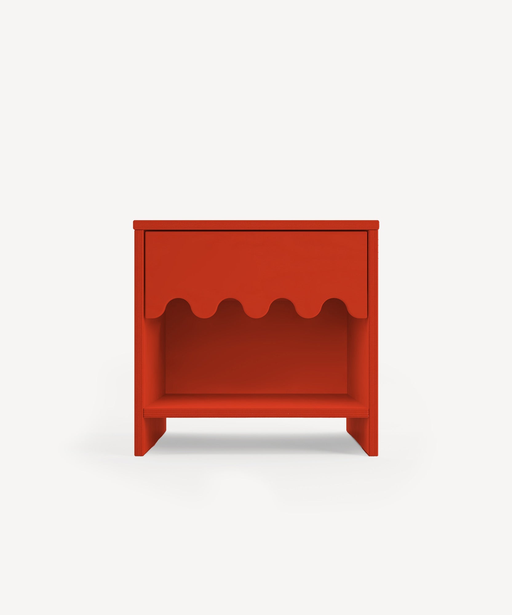 The Moss Nightstand features a scalloped drawer front and an open lower shelf, set against a plain white background.