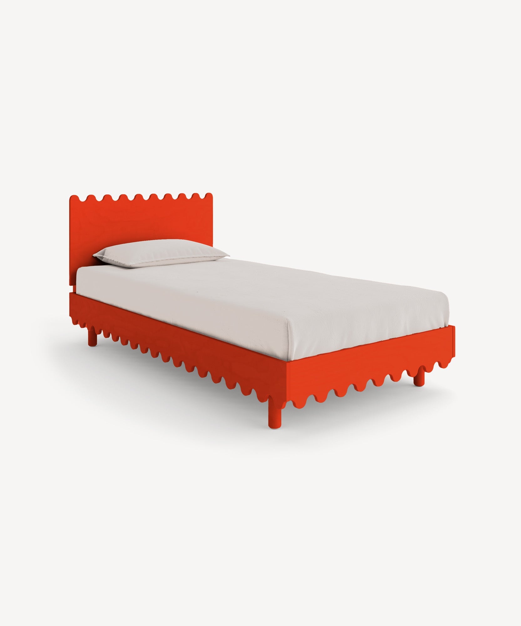 The Moss Twin Bed is a vibrant red bed frame with wavy edges, featuring a white mattress and pillow against a plain white background.