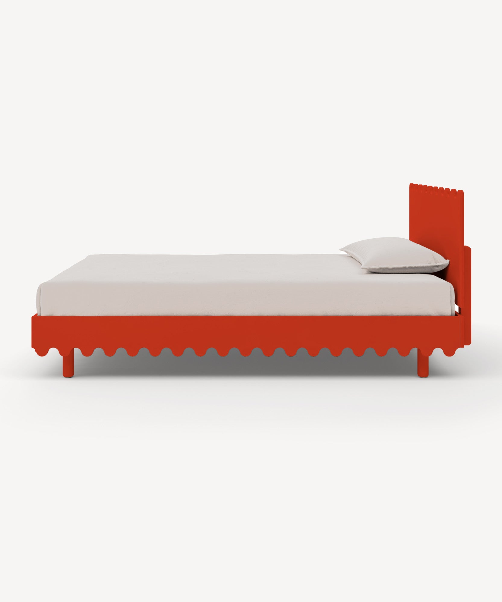 Moss Twin Bed: Red, minimalist platform bed with a scalloped edge and one pillow on a white background.