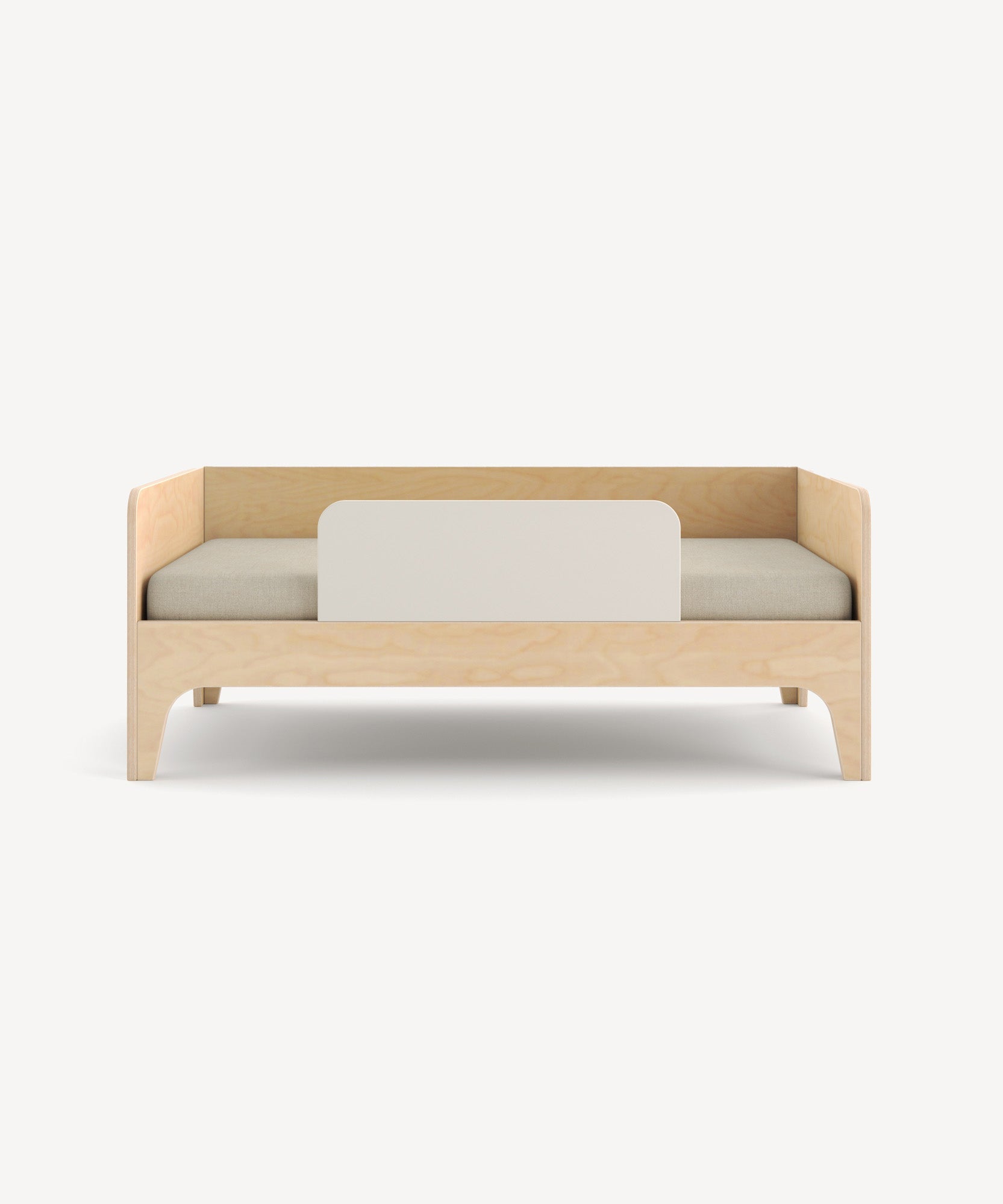 Perch Toddler Bed: A minimalist wooden design featuring a guard rail and cushioned mattress.