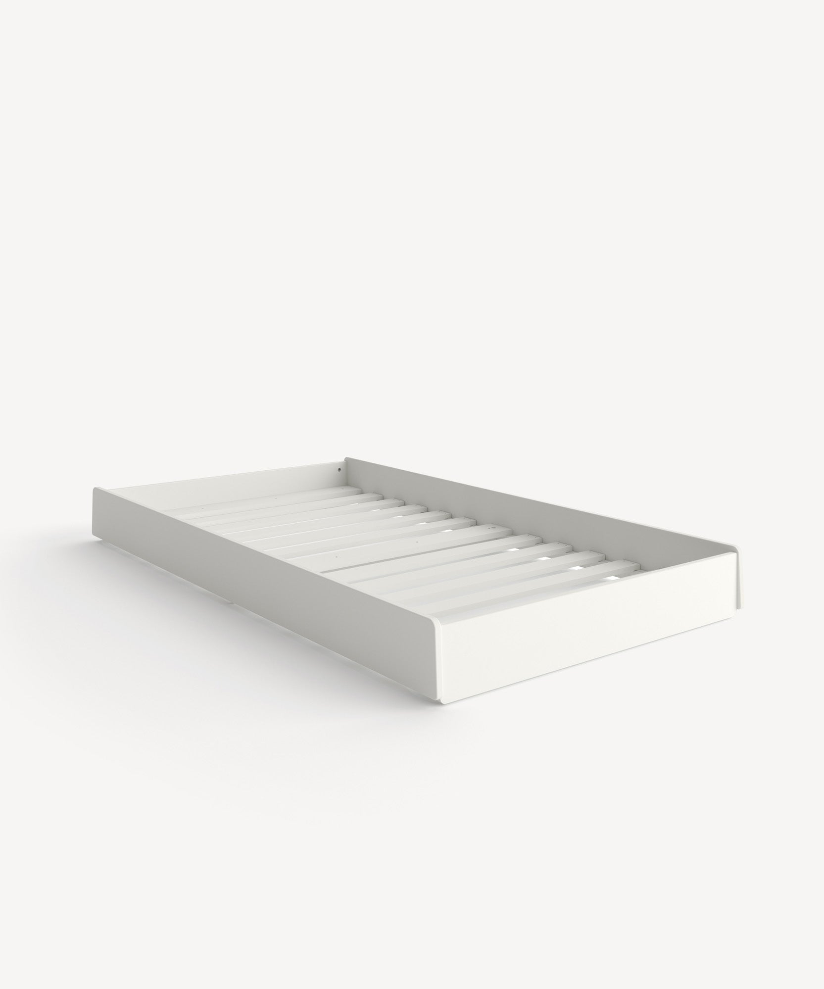 A Perch Trundle Bed & Ladder Conversion Kit with a slatted base, shown at an angle.