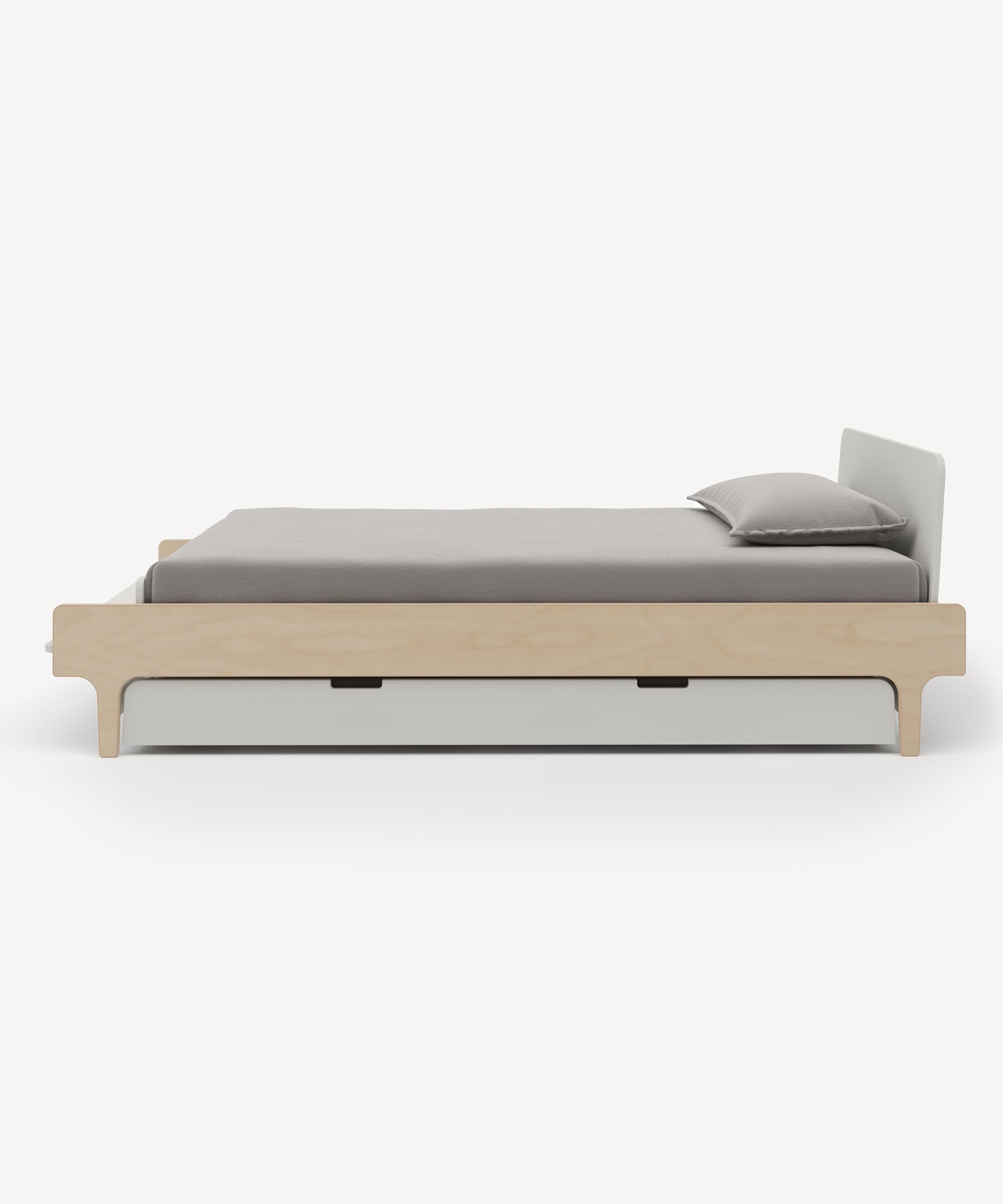 River Trundle Bed with gray bedding and pillow, side view against a white background.