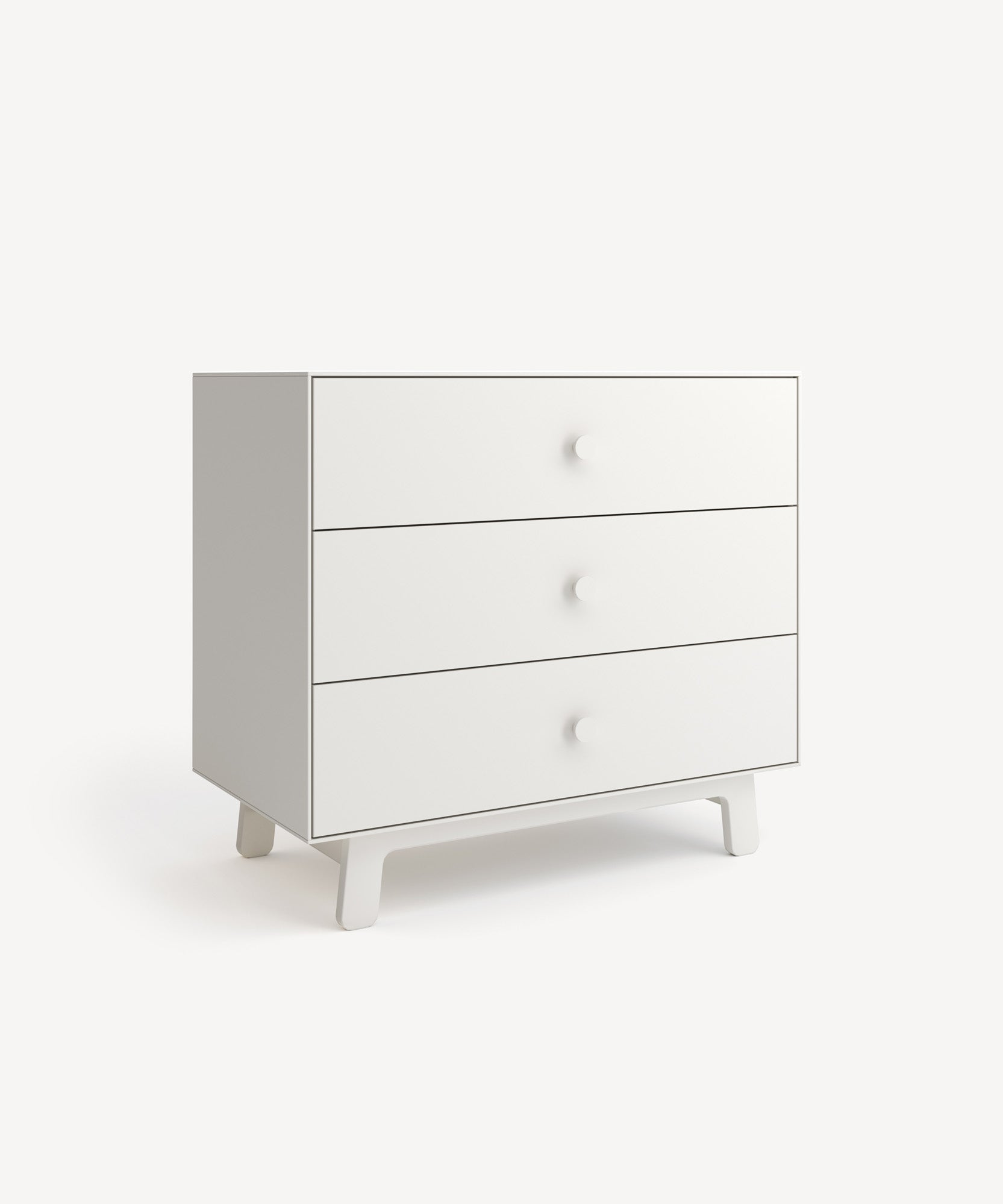 The Sparrow 3-Drawer Dresser, featuring a white minimalist design and short legs, is set against a plain background.
