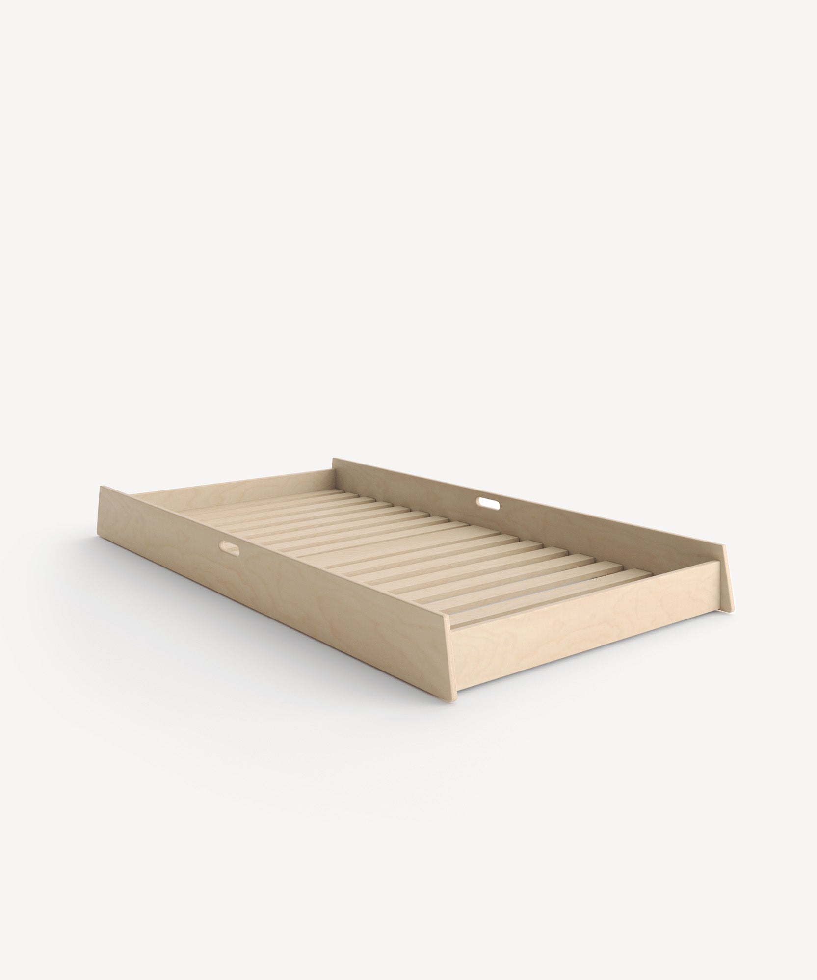 Sparrow Trundle Bed, featuring a light wooden under-bed storage drawer with a slatted base, set against a plain white background.