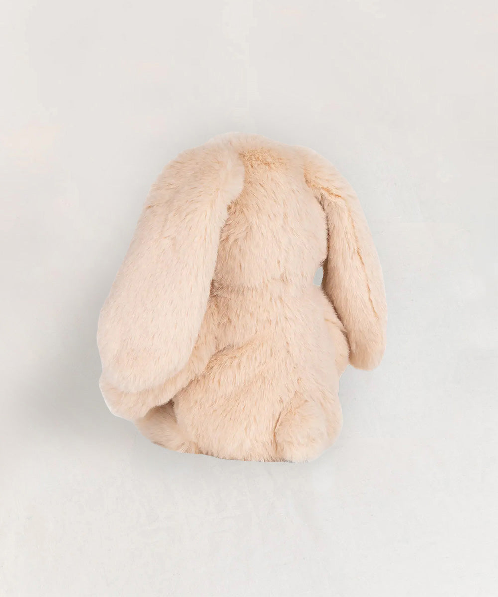 Bubbles le Bunny plush toy in beige with floppy ears, displayed from the back on a light background.