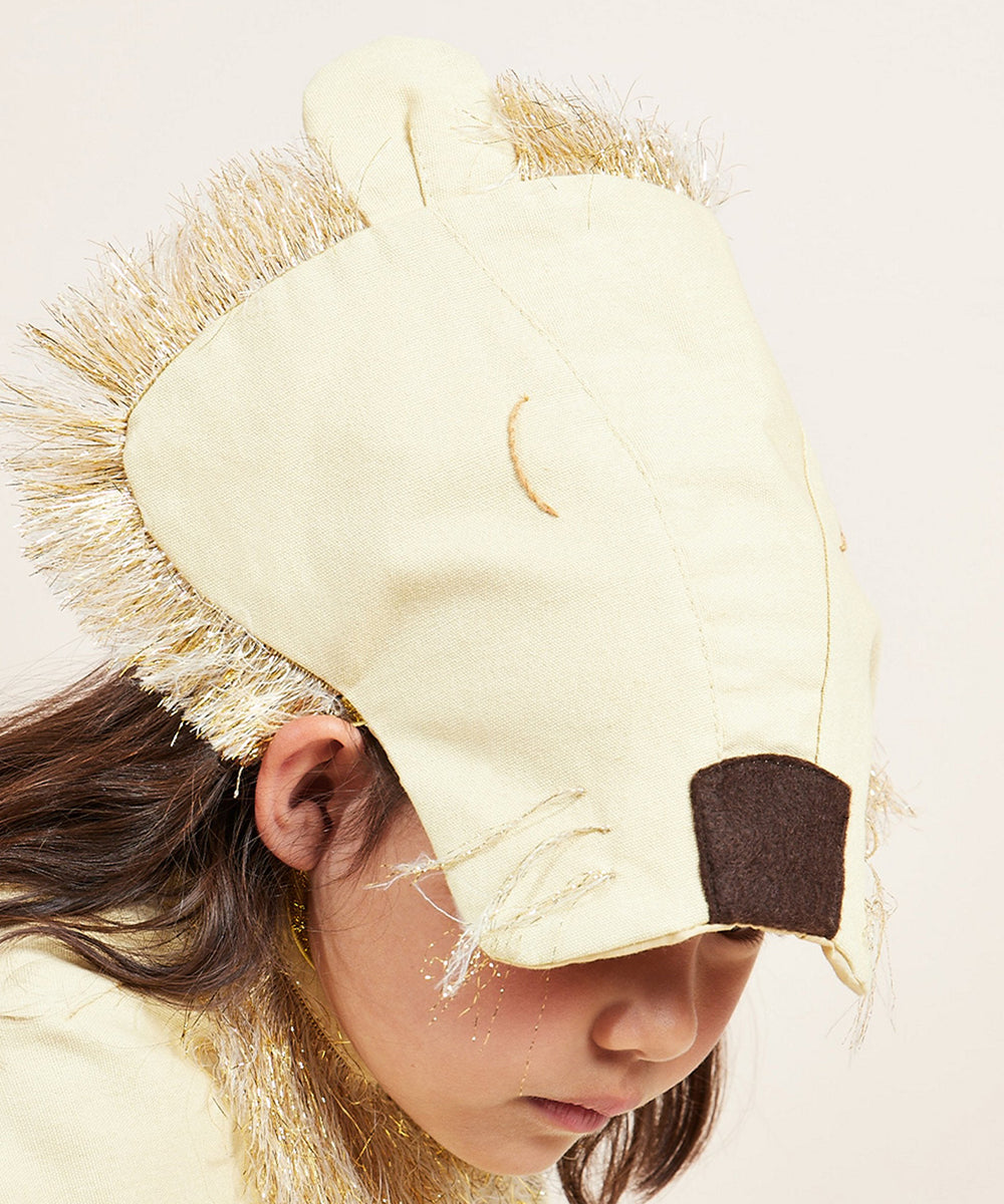 Child wearing a Lion Costume featuring a soft yellow mask, brown nose, and gold fringed mane.