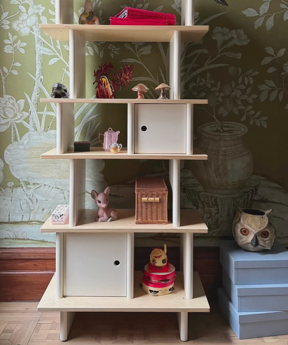 Vertical Mini Library with animated jumping mushrooms.