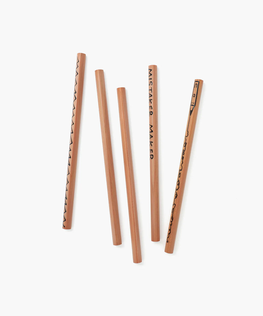 Four Le Mistake Maker Pencils on a white background, two featuring black doodles and text on their sides.