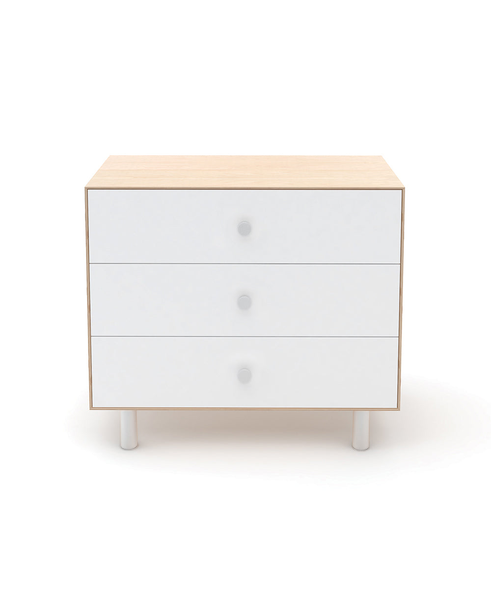 White and wood dresser with 3 deep drawers, metal knobs and legs.