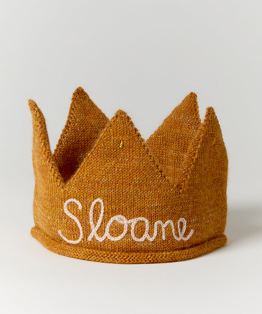 The Personalized Gold Crown - White features "Sloane" embroidered in white yarn on the front.