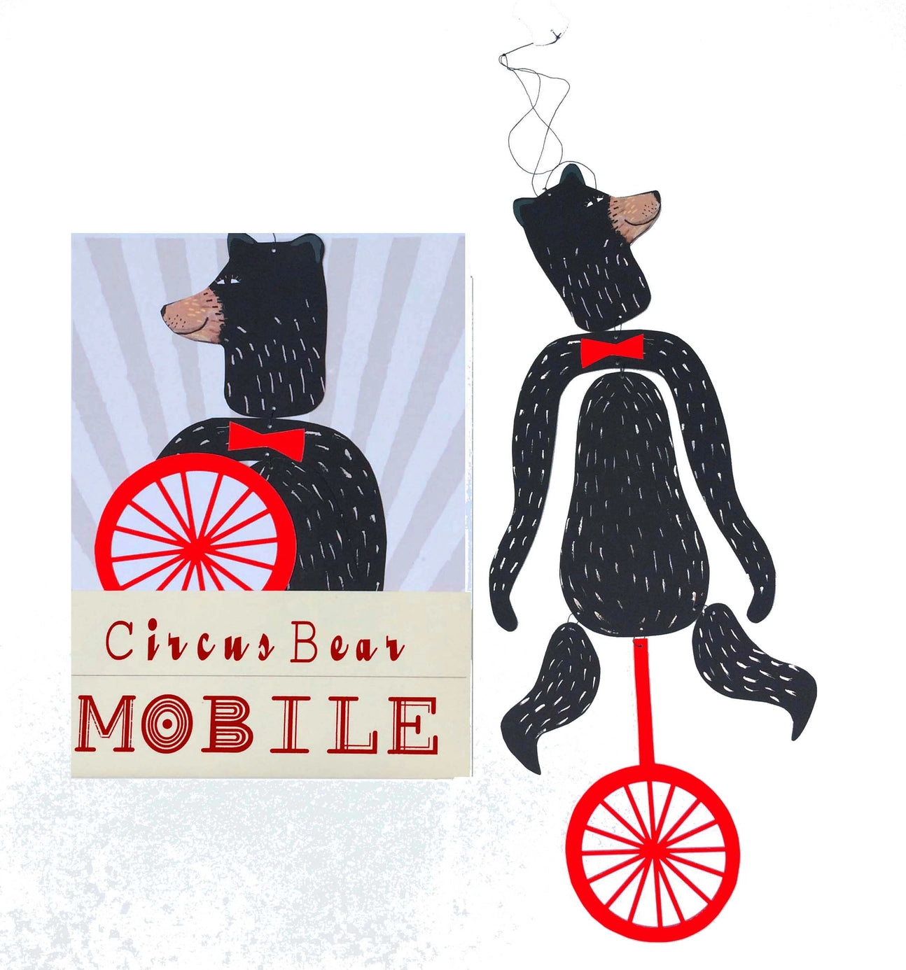Le Mobile - Circus Bear features a paper bear with a red bow tie and unicycle, shown beside its box labeled "Circus Bear MOBILE.
