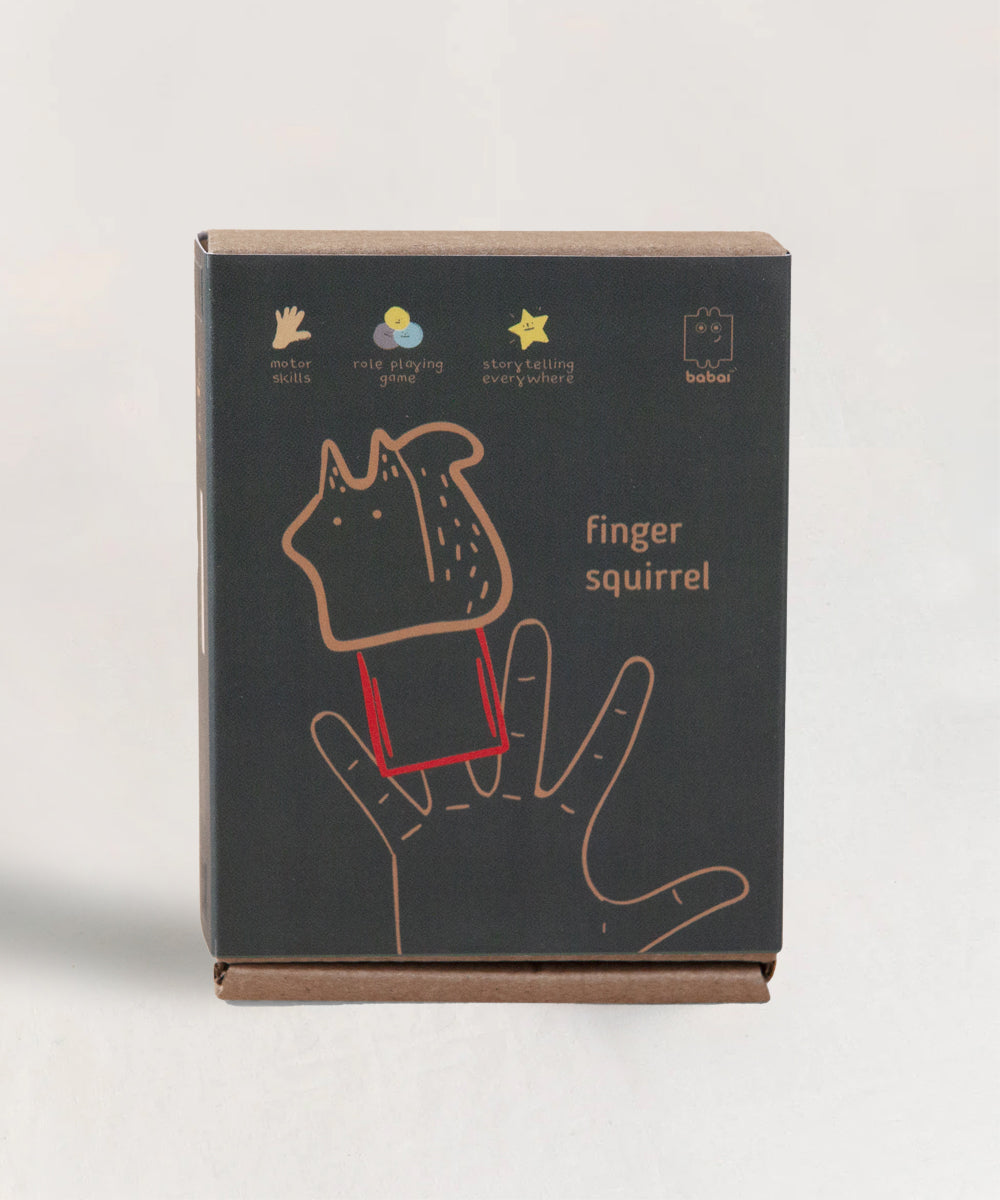 The Le Squirrel Finger Puppet box showcases a drawing of the puppet on a hand, designed for role-playing games and storytelling.