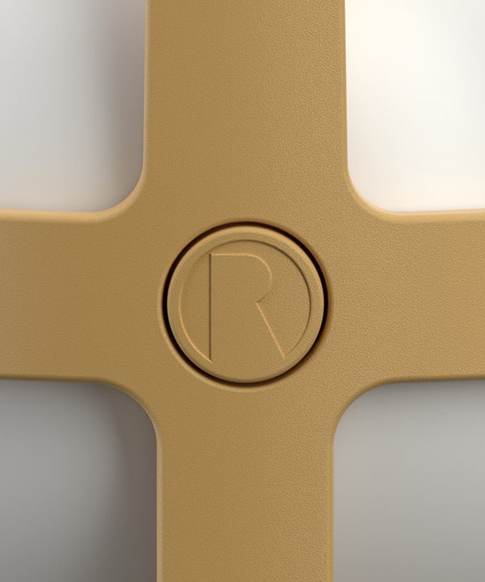 Close-up of a Rosendahl Soft Spot Solar Circular in Wheat, featuring a central circular logo with “R” on a light background.