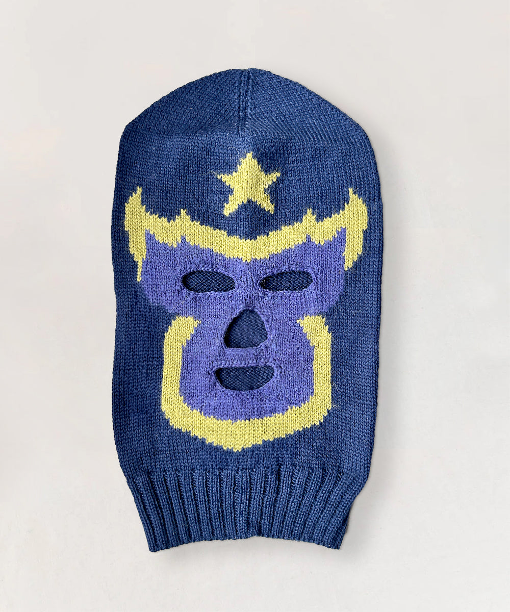 Blue knit Luchador Mask balaclava with purple and yellow star and flame design.