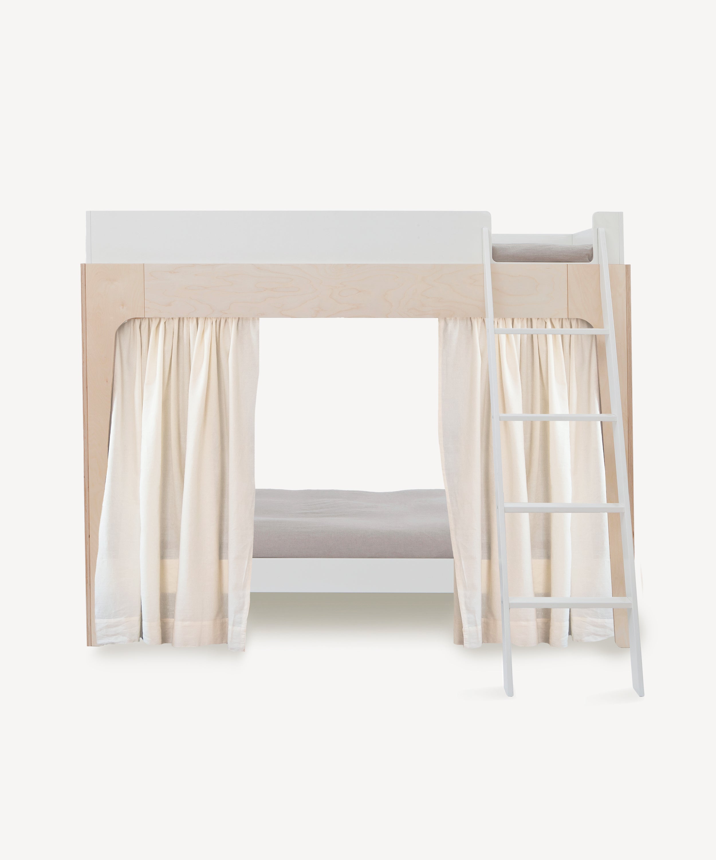 Perch Bunk Bed Curtains in cream hang on a modern wooden bunk bed with a white ladder, styled against a light background.
