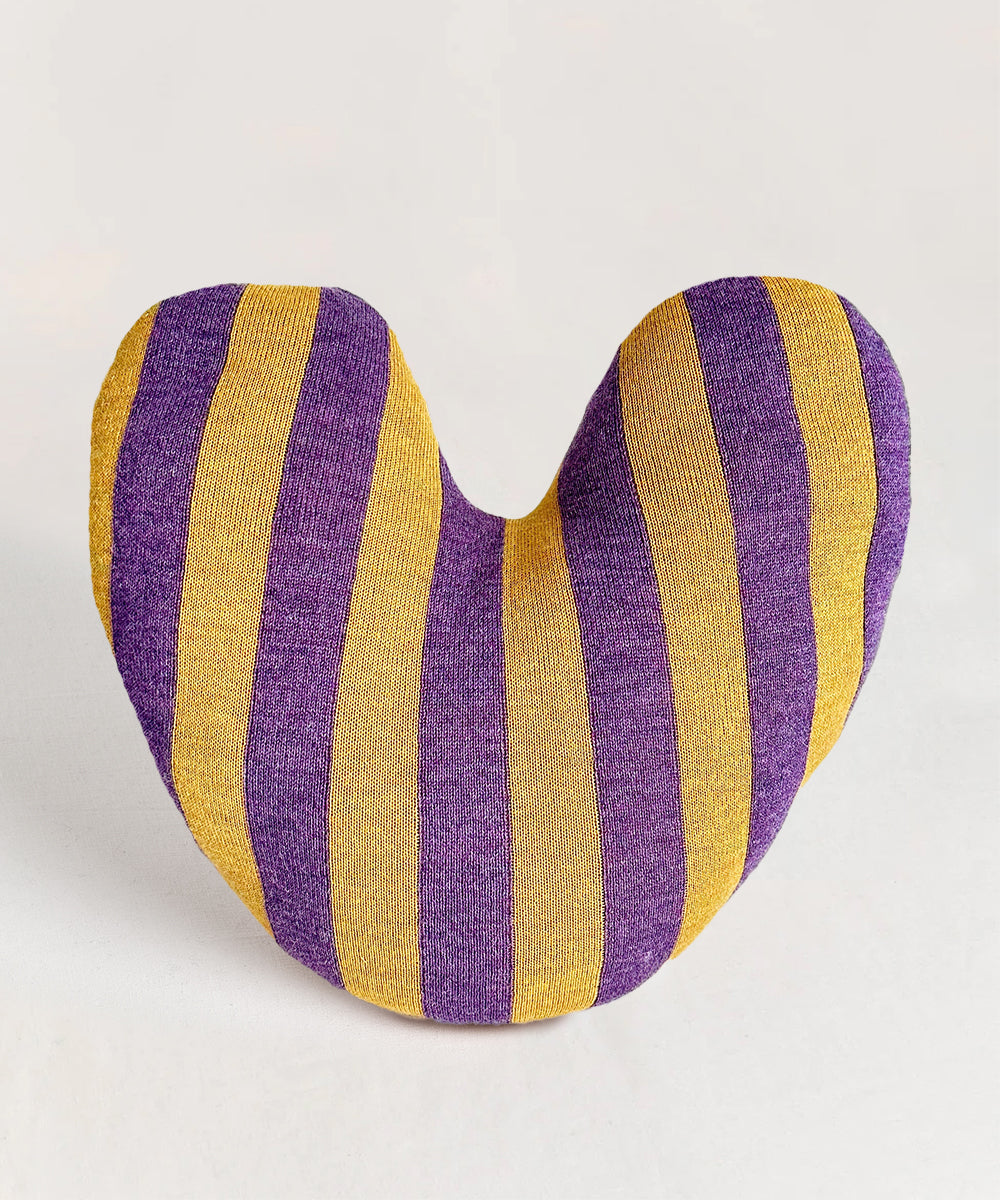 Striped Heart Pillow featuring purple and yellow stripes on a light background in a heart shape.