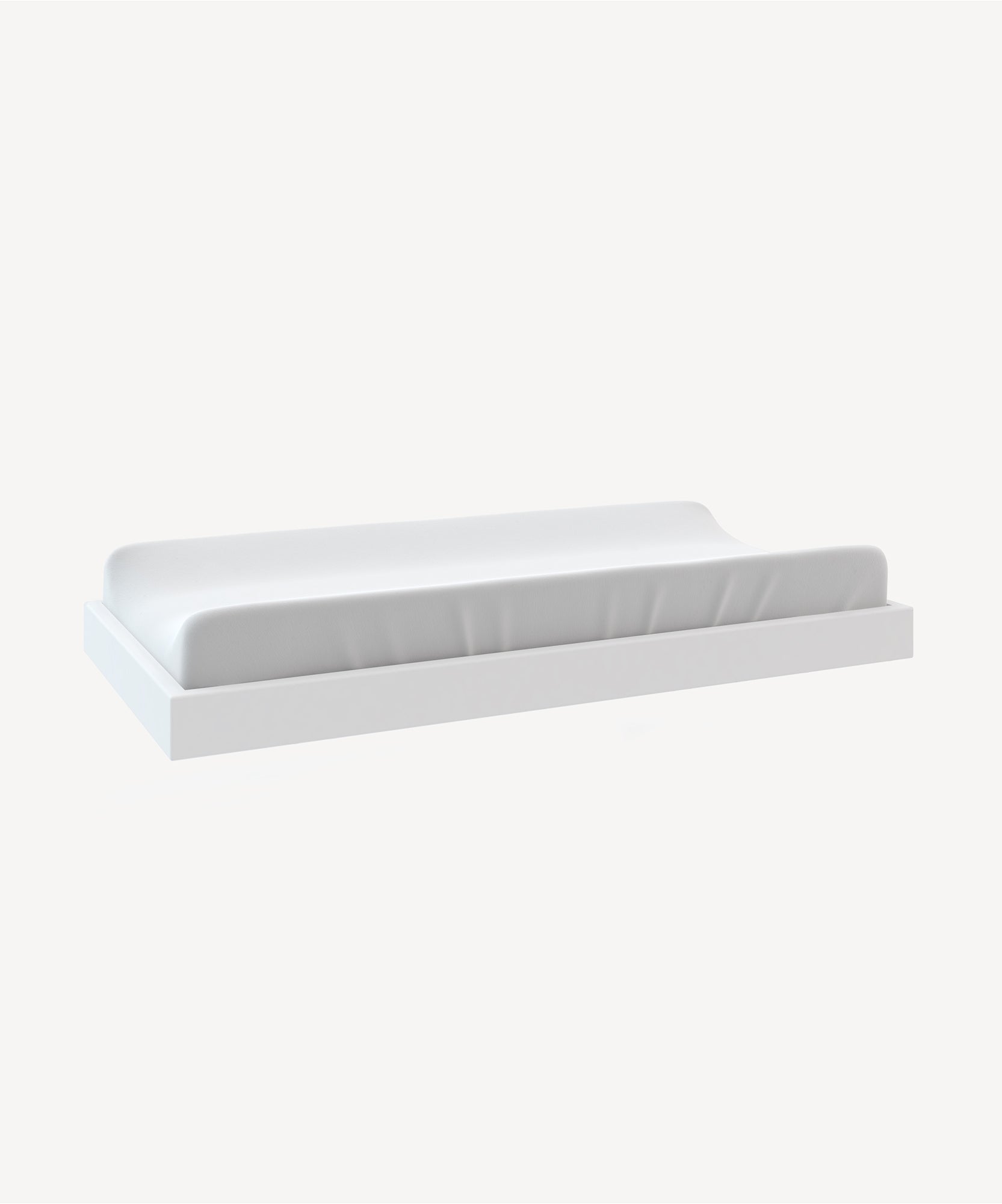 A minimalist, wall-mounted Changing Tray in white with a subtle top texture, against a light gray background.