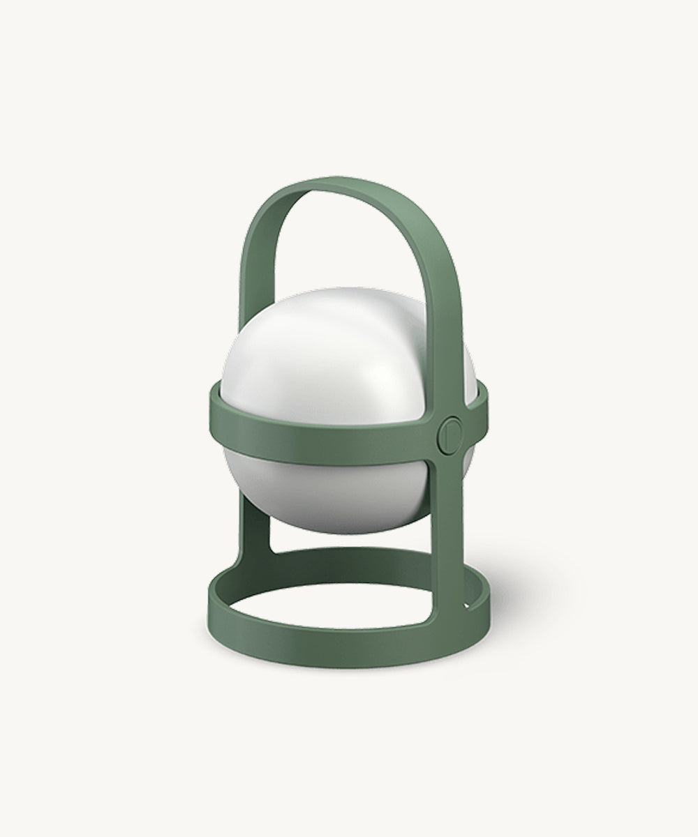 The Rosendahl Soft Spot Solar Circular, Pine Green, is a modern portable lantern with a green circular frame and handle, featuring a white spherical light in the center.