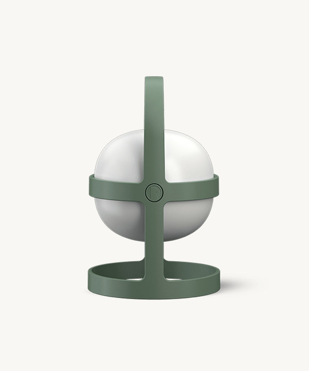 The Rosendahl Soft Spot Solar Circular, Pine Green, is a modern spherical white lamp with a green circular base and handle, shown front-facing on a plain white background.
