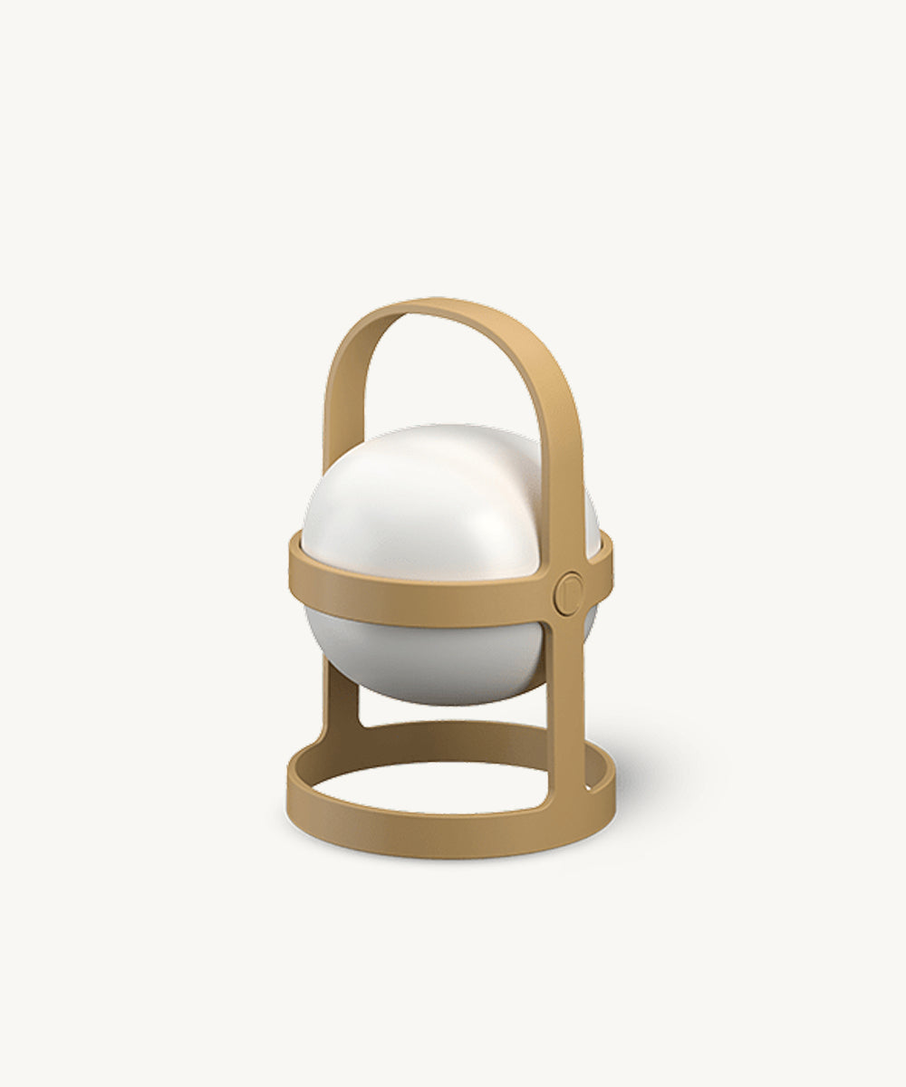 The Rosendahl Soft Spot Solar Circular, Wheat is a modern beige lantern with a white globe, circular base, and an arched handle.