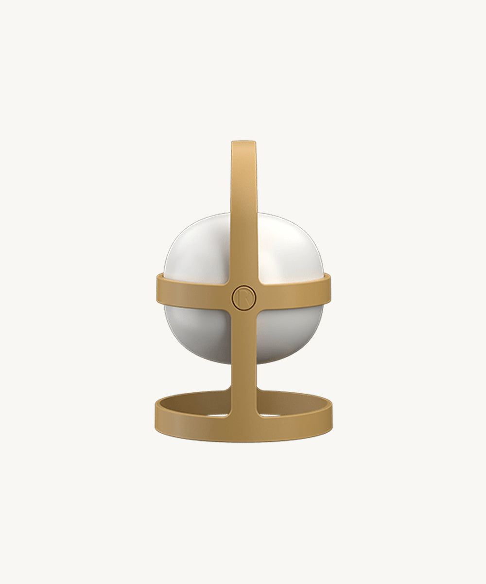 The Rosendahl Soft Spot Solar Circular in Wheat features a modern gold and white sphere on a minimalist stand with a central handle and circular base, set against a plain background.
