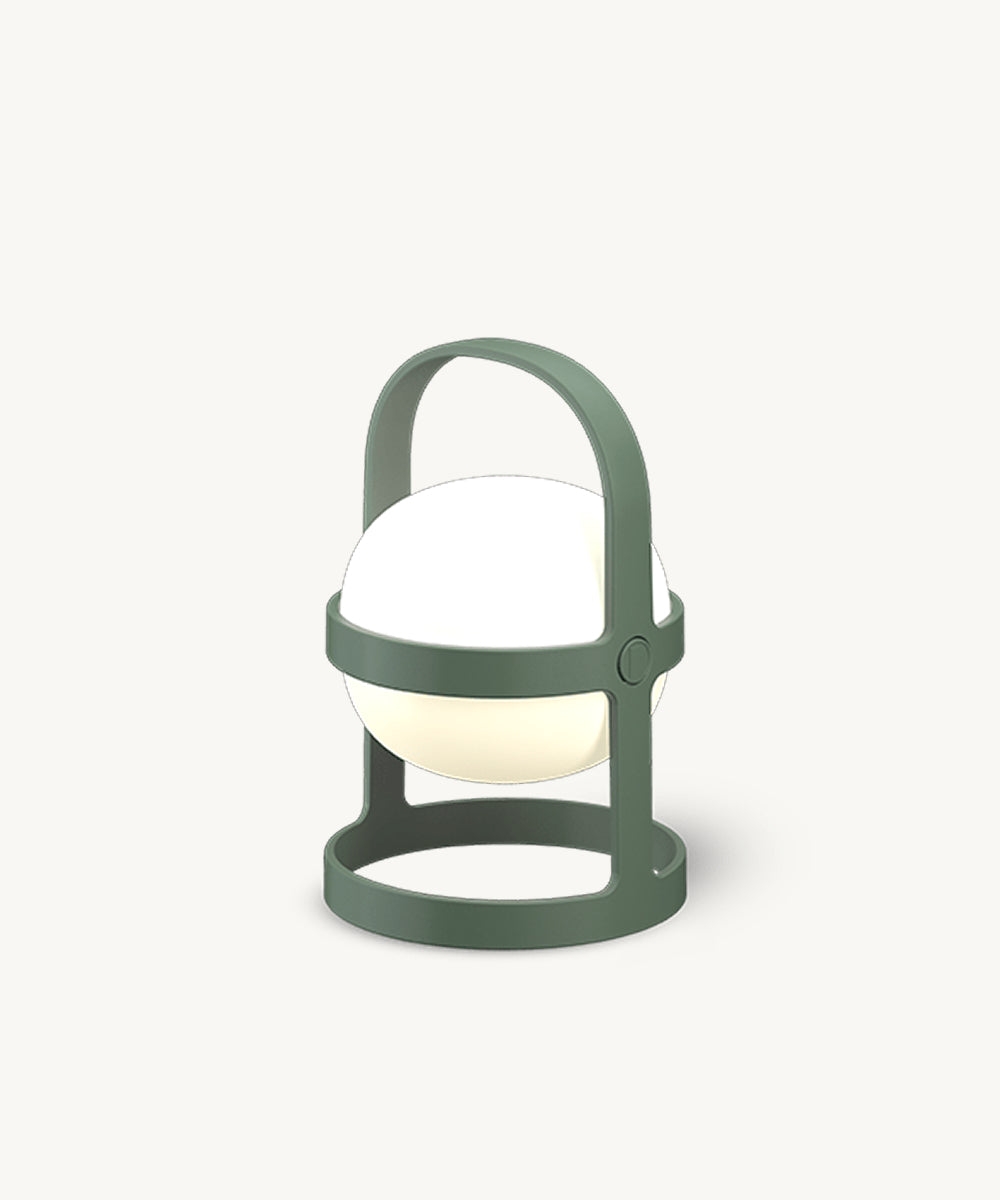 The Rosendahl Soft Spot Solar Circular in Pine Green: a modern round lantern with handle, glowing white light, on a plain white background.