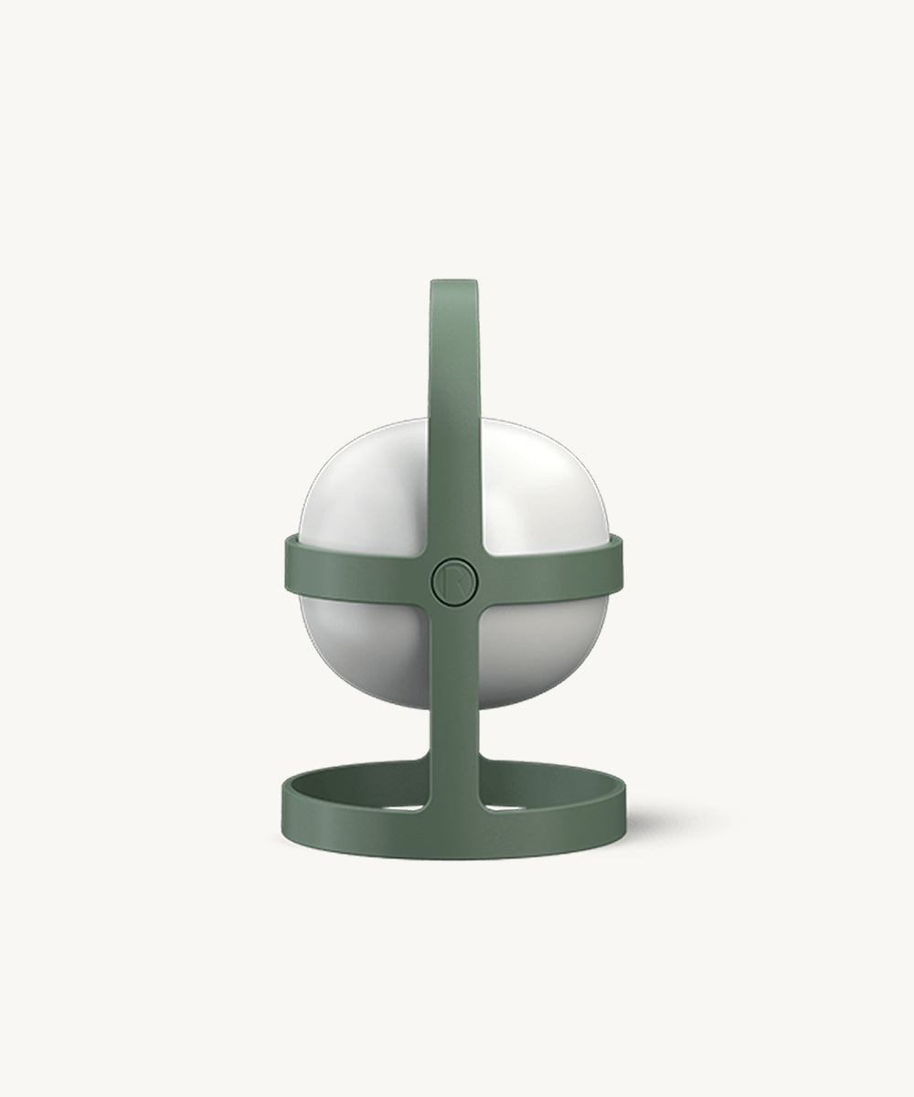 The Rosendahl Soft Spot Solar Circular in Pine Green features a white globe within a green circular frame, handle, and matching base.