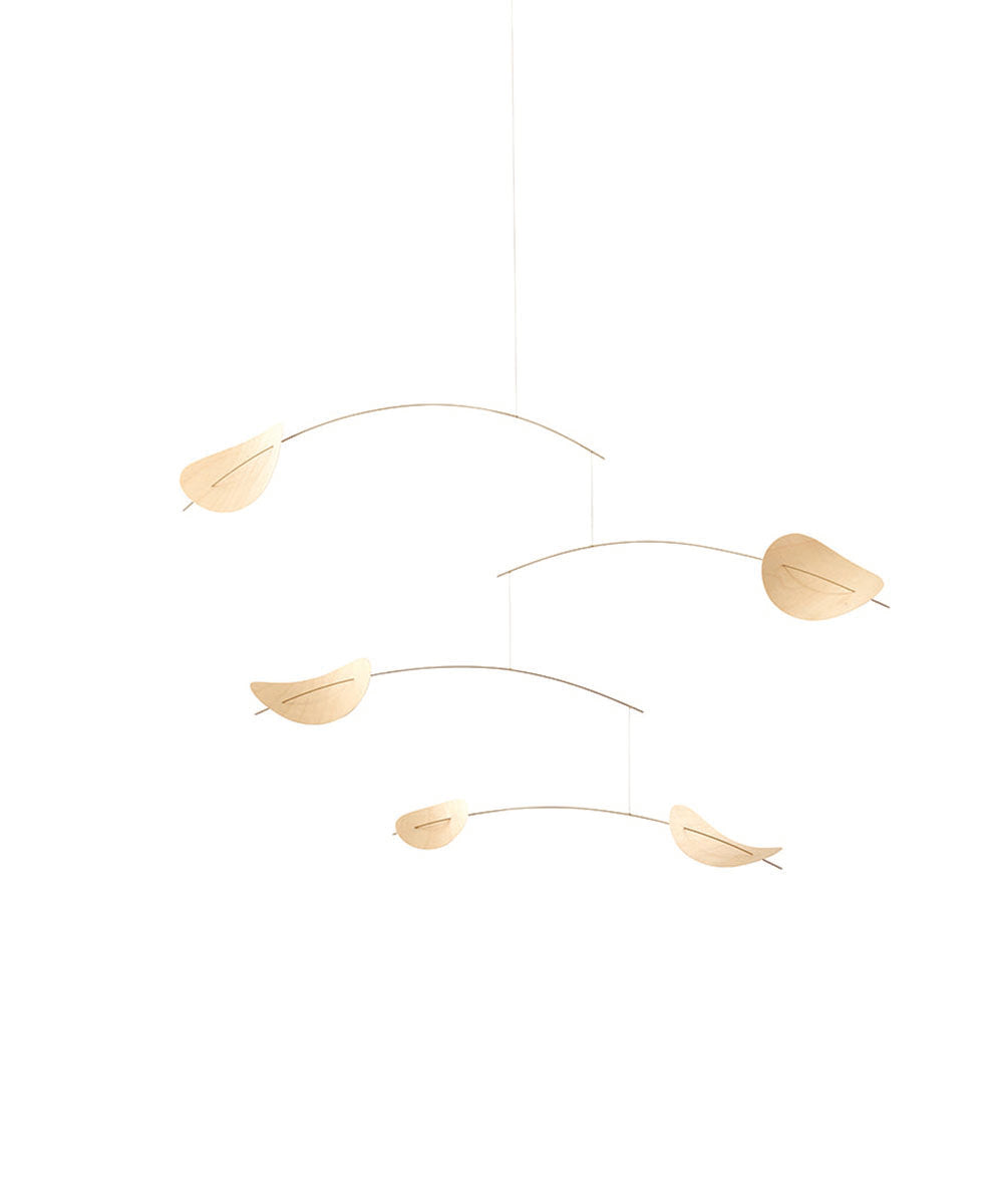 Le Drifting Clouds is a minimalist wooden mobile featuring curved rods and leaf-shaped pieces, displayed against a white background.